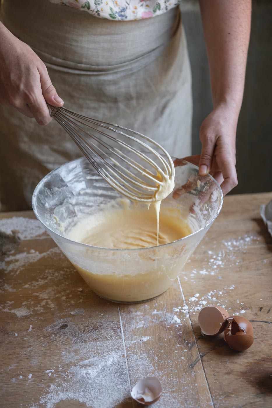 Woman mixing batter in a baking bowl